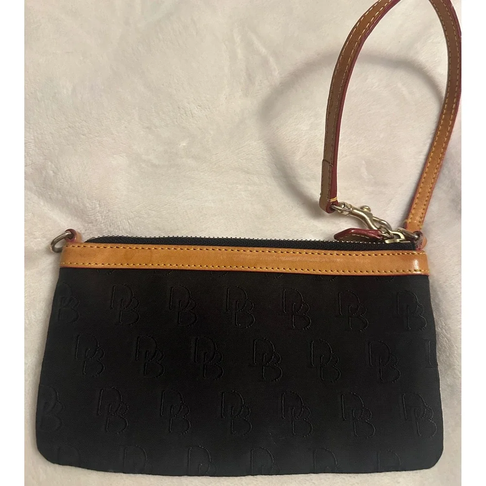 Dooney & Bourke Black Monogram Canvas Wristlet Pouch Tan Leather Trim Red Lining